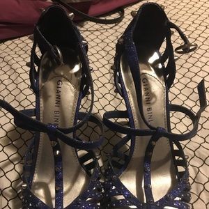 Blue spiked heels.